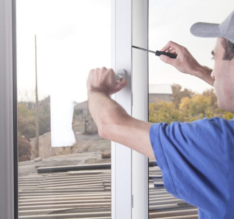 A specialist working on a project for window replacement