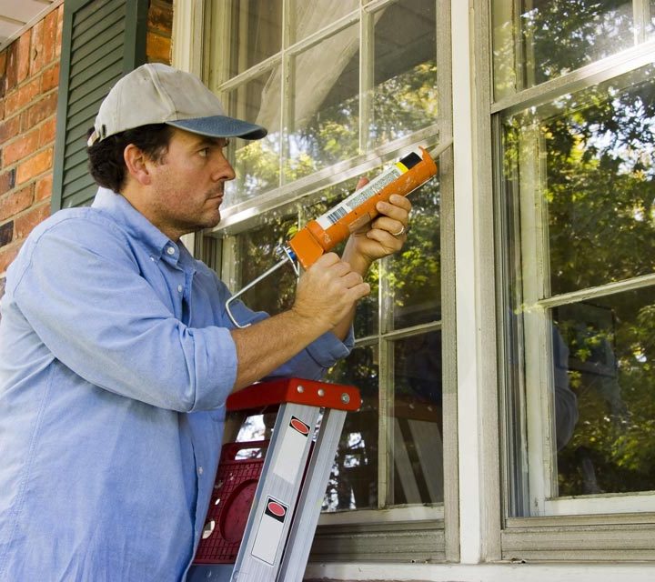 Air sealing the window to keep the property dry and prevent any moisture from accumulating inside the house
