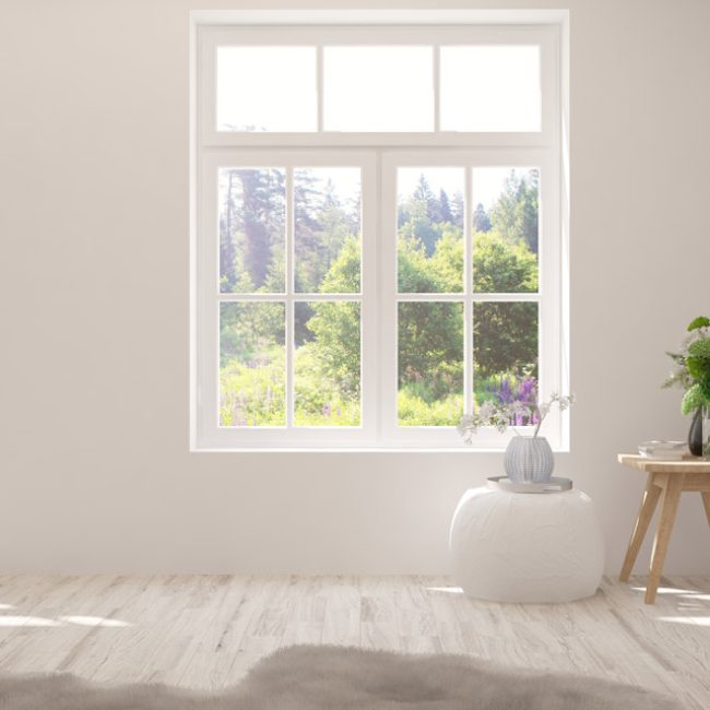 A clean-looking window of a house with simple interior design